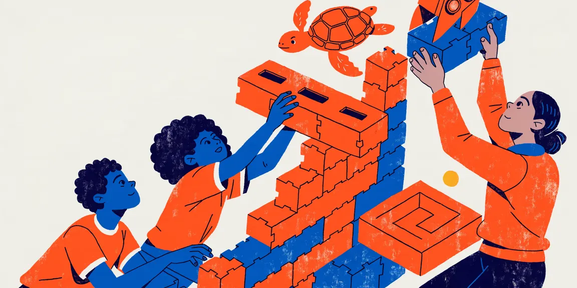 Tres chicos de distintas edades construyen un mundo encastrando bloques de programación.