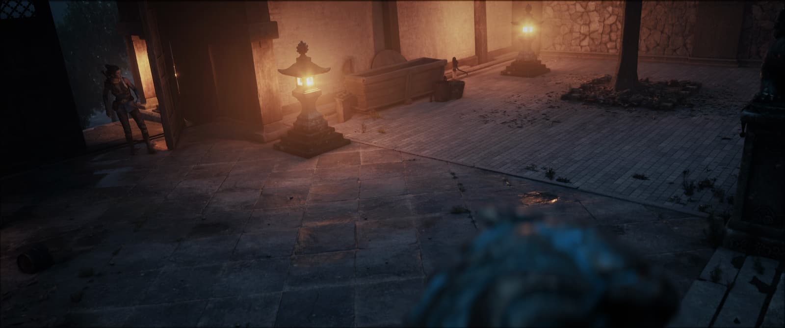 Recorrido de cámara por un patio japonés al anochecer, iluminado por faroles, renderizado en Unreal Engine.